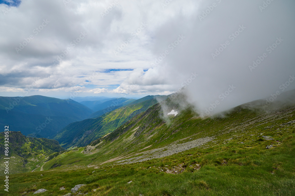 Landscape with the Fagarasi mountains in Romania on a summer day. Landscape with the Fagarasi mountains in Romania on a summer day.