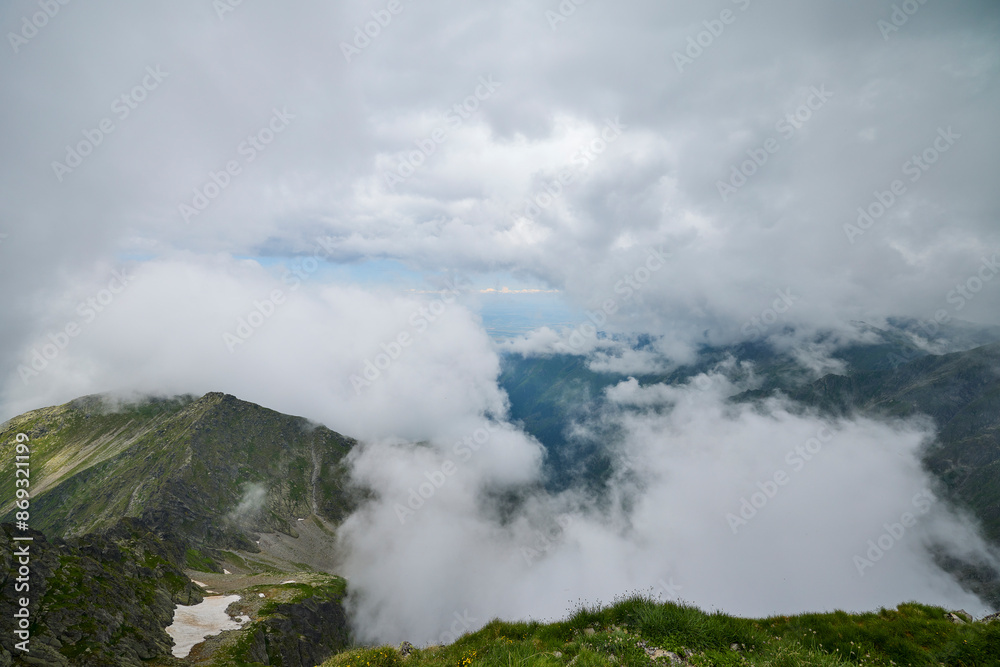 Landscape with the Fagarasi mountains in Romania on a summer day. Landscape with the Fagarasi mountains in Romania on a summer day.