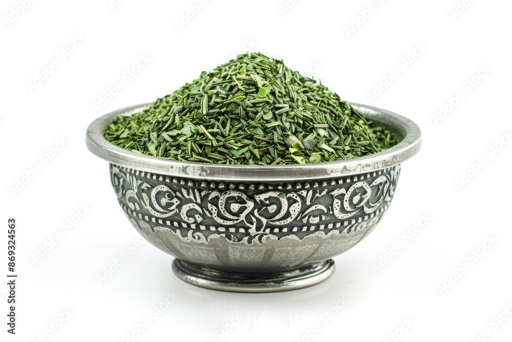 A metal bowl filled with fresh green herbs, ideal for cooking or garnish A metal bowl filled with fresh green herbs, ideal for cooking or garnish