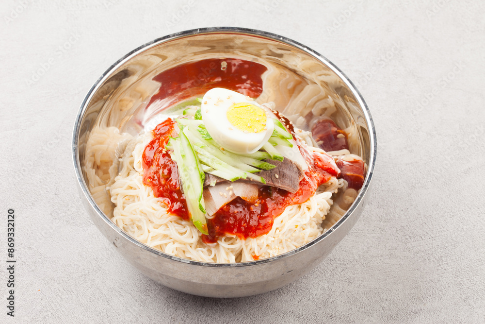  A food made by boiling ingredients such as onions and peppers, then pouring the cooled soy sauce over prepared crabs several times and allowing them to age.