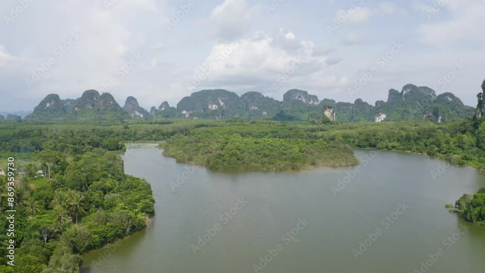 Aerial top view of Samet Nangshe, Phang Nga, lush green trees from above in tropical forest in national park in summer season. Natural landscape. Pattern texture background. Aerial top view of Samet Nangshe, Phang Nga, lush green trees from above in tropical forest in national park in summer season. Natural landscape. Pattern texture background.