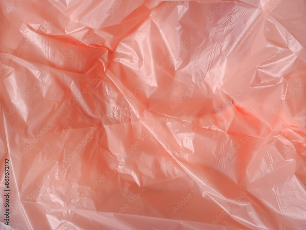 Fototapeta premium Old rose colored plastic bag texture for abstract background. 