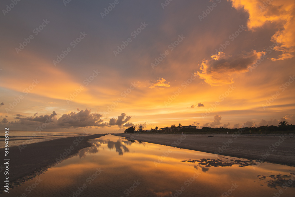 sunset reflections over sanibel island Florida during golden hour