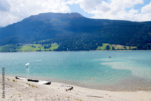 Kitesurfer am Reschensee in Südtirol photo