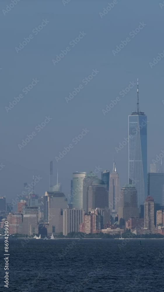 Stunning panoramic view of Manhattan, New York, showcasing iconic skyscrapers during the golden afternoon. Ideal for capturing the city's skyline in dynamic stock footage. Stunning panoramic view of Manhattan, New York, showcasing iconic skyscrapers during the golden afternoon. Ideal for capturing the city's skyline in dynamic stock footage.