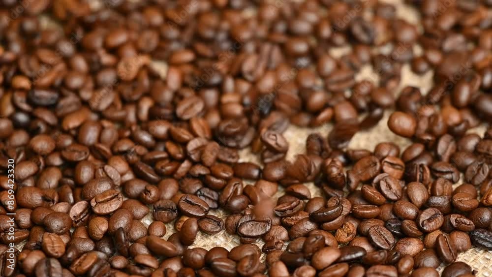 background of rotating coffee beans background of rotating coffee beans