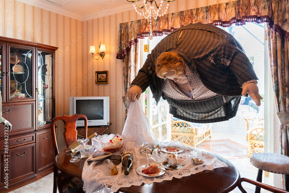 Fototapeta premium JAPAN - Nov 13, 2023: Aunt Marge Dursley fat lady floating over a dining table in a vintage living room creating whimsical and fantastical at Warner Bros. Studio Tour Tokyo, The Making of Harry Potter