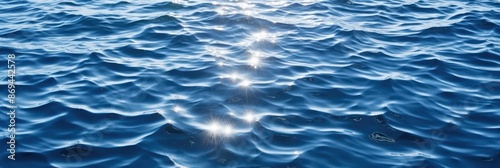 Sun Glints on the Rippling Ocean, sparkling sunlight reflecting on the deep blue sea