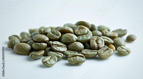 Close Up of Green Coffee Beans on a White Surface