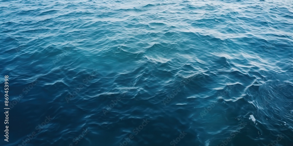 Fototapeta premium Ocean Waves Abstract, A dark blue sea with ripples