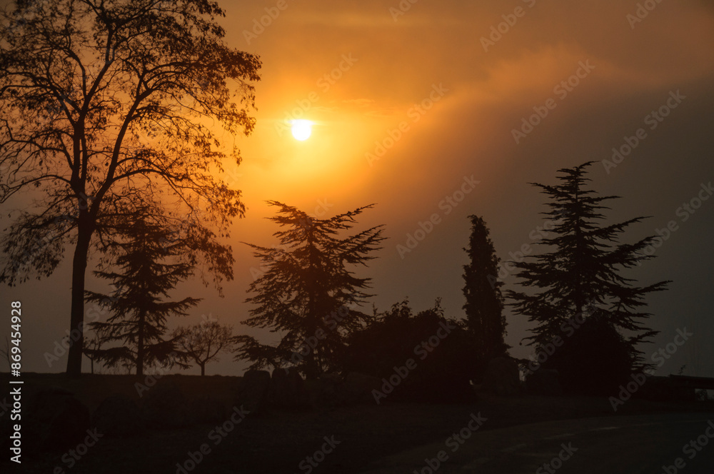 Foggy sunrise at the height of Montserrat Abbey (Barcelona, Catalonia, Spain)