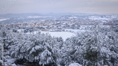 General view of the snowy town of Navàs in winter (Bages, Barcelona, Catalonia, Spain) photo