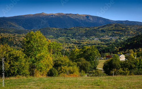 Donezan region in autumn, seen from the road to Col de Pailhères mountain pass. In the background, the Roc de Madres mountain (Ariège, Occitanie, France, Pyrenees) photo