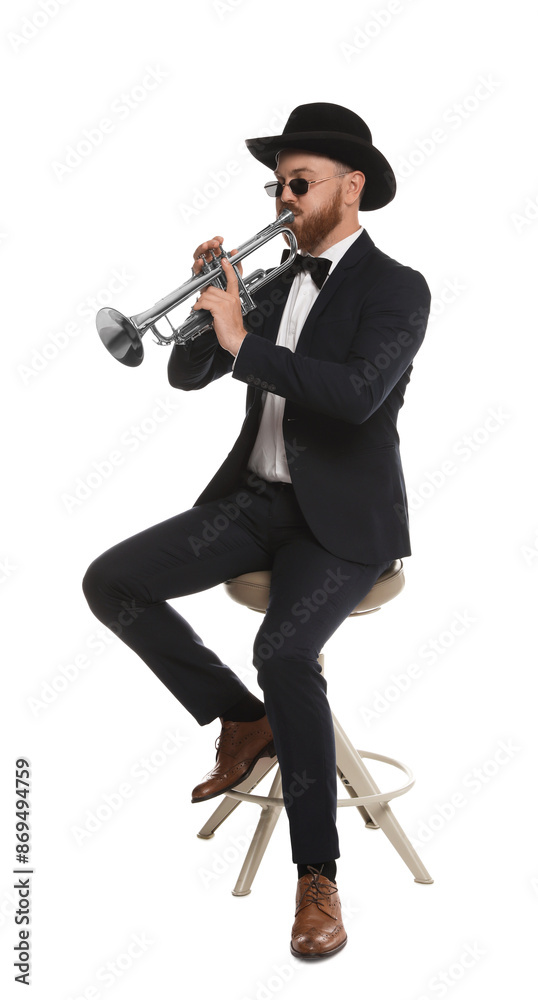 Fototapeta premium Handsome musician playing trumpet on white background