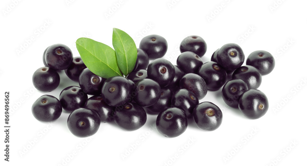 Fresh ripe acai berries and green leaves isolated on white Fresh ripe acai berries and green leaves isolated on white