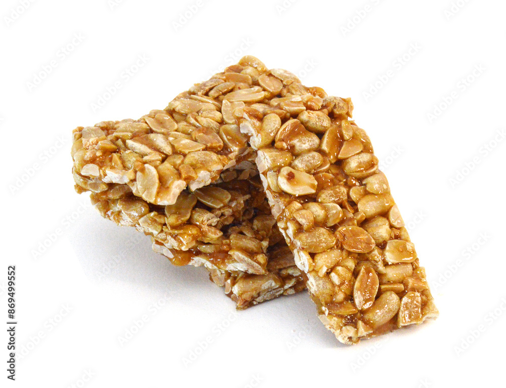 Honey bars with peanuts, sesame and sunflower seeds isolated Honey bars with peanuts, sesame and sunflower seeds isolated