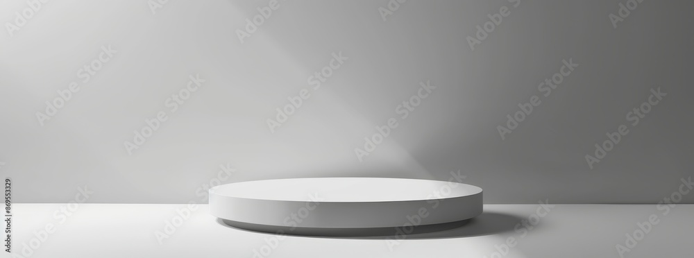 The serene white podium is softly illuminated by a sunbeam, providing a minimalist ambiance suitable for showcasing products or presentations. Its clean design encourages focus and tranquility The serene white podium is softly illuminated by a sunbeam, providing a minimalist ambiance suitable for showcasing products or presentations. Its clean design encourages focus and tranquility