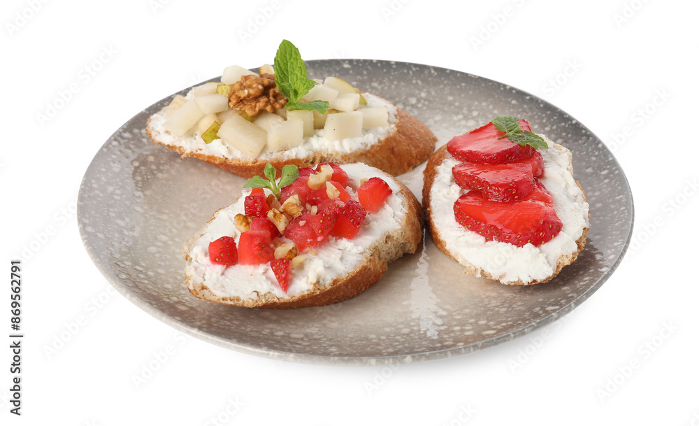 Delicious ricotta bruschettas with pear, strawberry and walnut isolated on white Delicious ricotta bruschettas with pear, strawberry and walnut isolated on white
