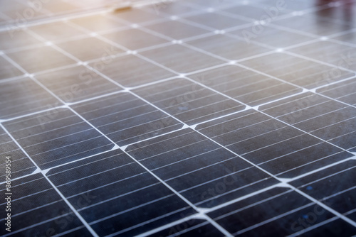 Close-up of blue solar panel landscape installed on the roof of an industrial building to produce green electricity. Sustainable resource storage and renewable energy