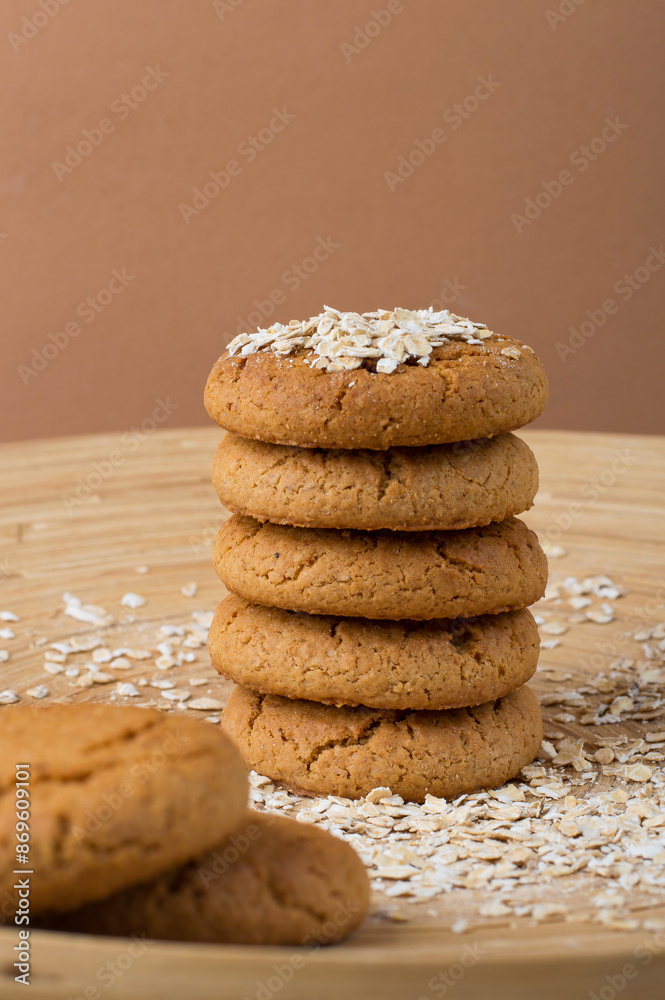 A stack of oatmeal cookies on a wooden stand. Healthy dietary oatmeal cookies. . A stack of oatmeal cookies on a wooden stand. Healthy dietary oatmeal cookies. .