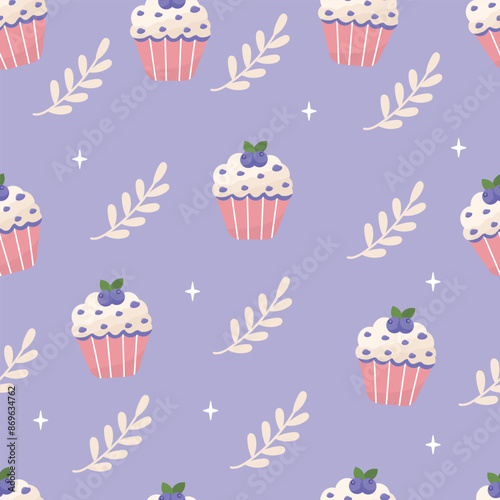Cute hand drawn blueberry cupcakes seamless pattern on blue background