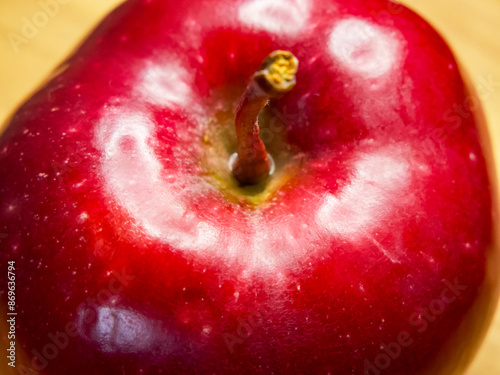 Juicy Apple Freshness. A juicy red apple with visible water droplets. photo