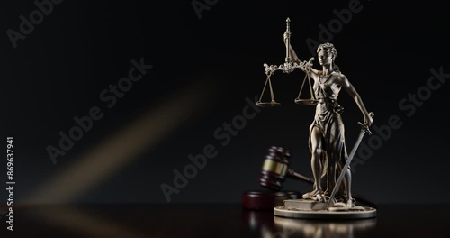 Legal Concept: Themis is the goddess of justice and the judge's gavel hammer as a symbol of law and order on the background of books