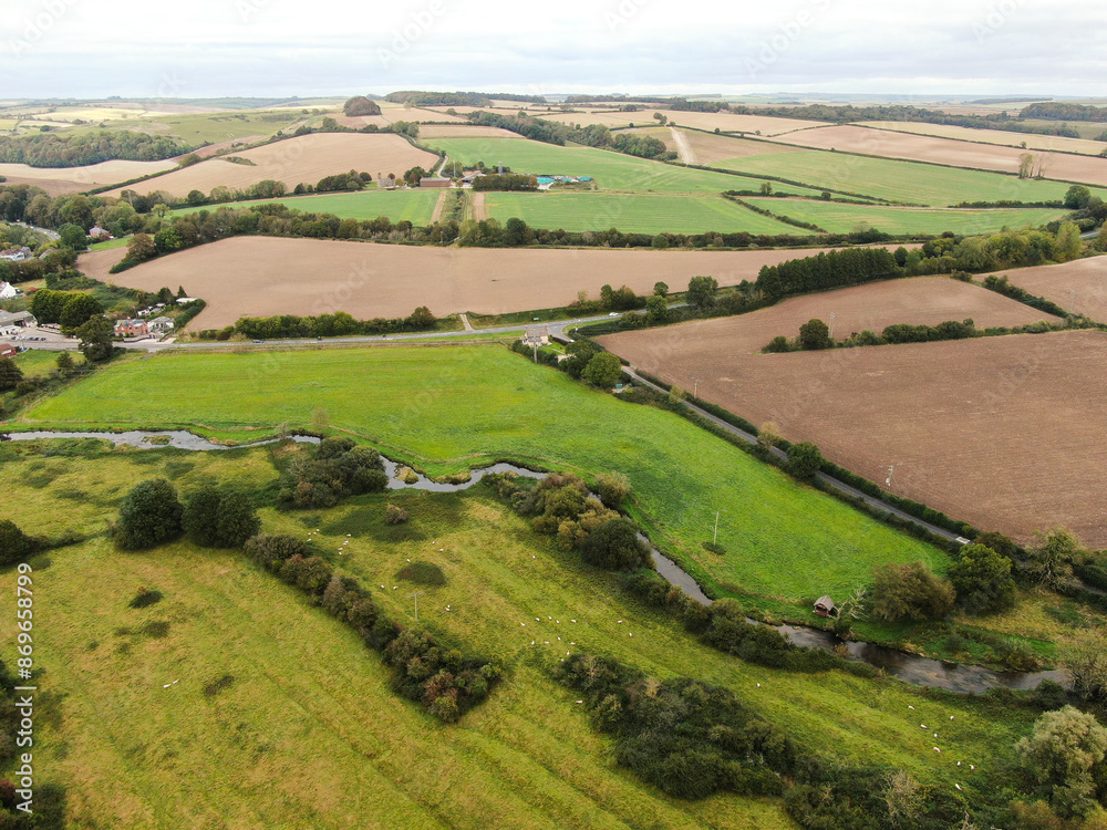 An aerial drones view of rolling countryside in Dorset England An aerial drones view of rolling countryside in Dorset England