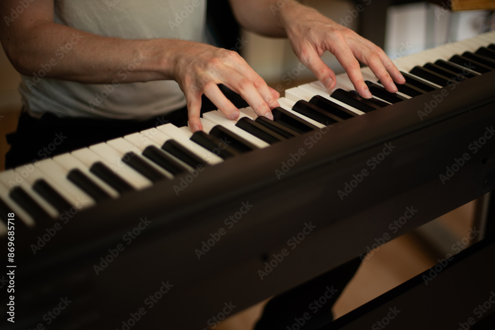 Close-up of Hands Playing an Electric Piano Close-up of Hands Playing an Electric Piano