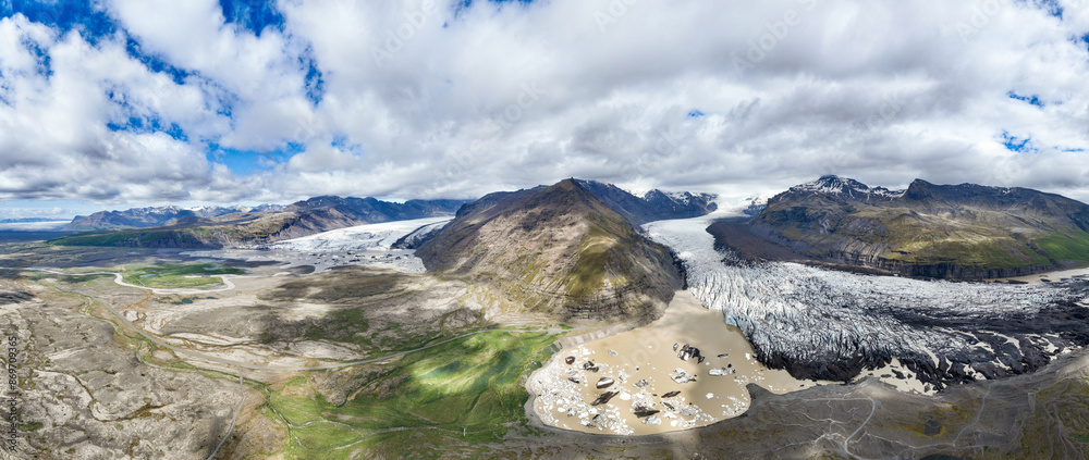 View from above, aerial shot, stunning panoramic view of the Svínafellsjökull glacier. Svínafellsjökull is an outlet glacier of Vatnajökull, the largest ice cap in Europe. Iceland.
