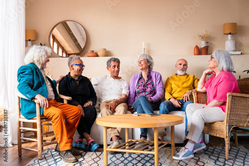 Obraz na plátne Group of happy senior friends bonding at home for dinner party - Cheerful and yo