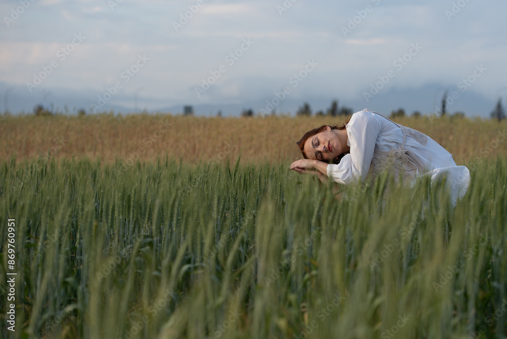 Young woman dancing outdoors. Modern dance performance in the meadow field. Carefree and freedom in nature Young woman dancing outdoors. Modern dance performance in the meadow field. Carefree and freedom in nature