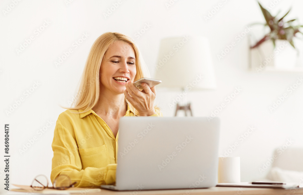 Leaving Voice Message. Mature Manager Recording Her Voice, Working In Office Leaving Voice Message. Mature Manager Recording Her Voice, Working In Office