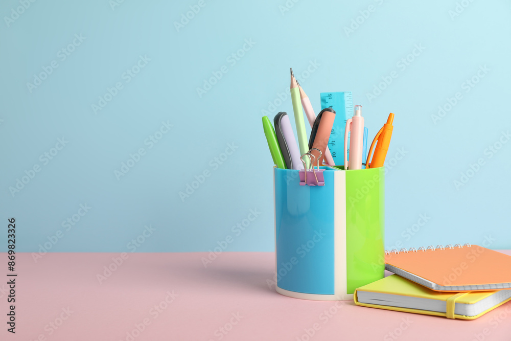 Fototapeta premium Different stationery on color background, space for text