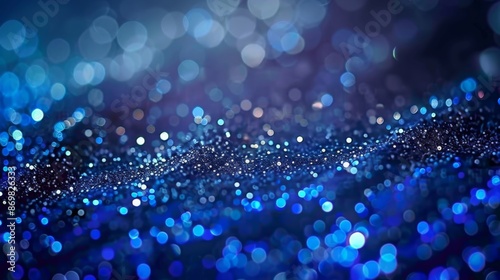 Bokeh background with sapphire glow. Unfocused royal blue glow. Crystal drops and sequins wallpaper. Holiday texture confetti wallpaper.