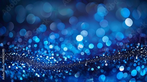 Bokeh background with sapphire glow. Unfocused royal blue glow. Crystal drops and sequins wallpaper. Holiday texture confetti wallpaper.