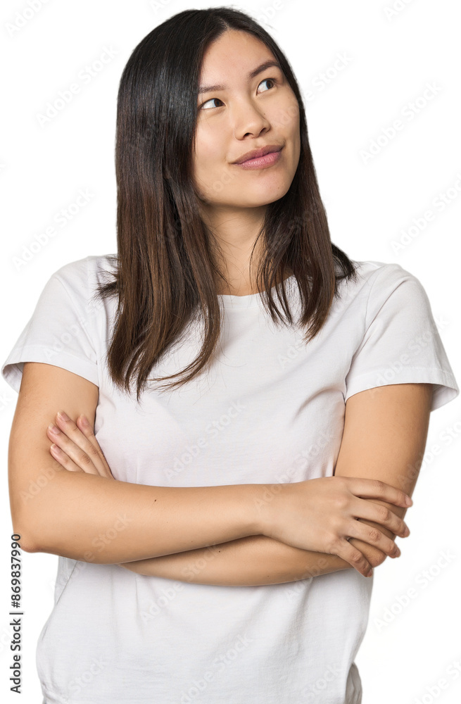 Young Chinese woman dreaming of achieving goals and purposes Young Chinese woman dreaming of achieving goals and purposes