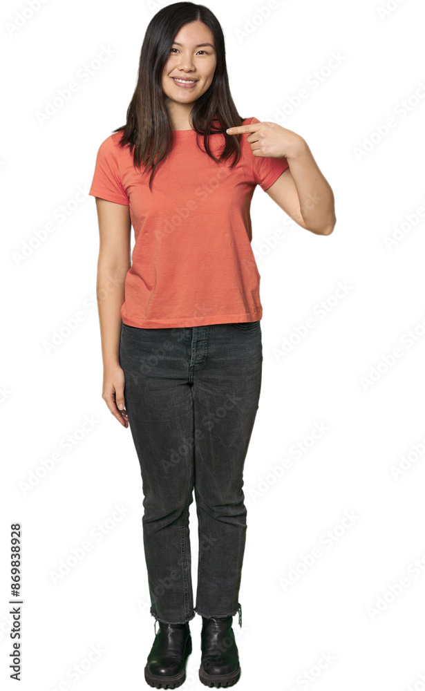 Full-body young Chinese woman person pointing by hand to a shirt copy space, proud and confident Full-body young Chinese woman person pointing by hand to a shirt copy space, proud and confident