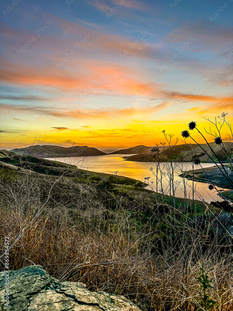 sunset over an inlet