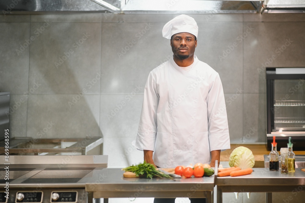 handsome african american chef at restaurant kitchen handsome african american chef at restaurant kitchen
