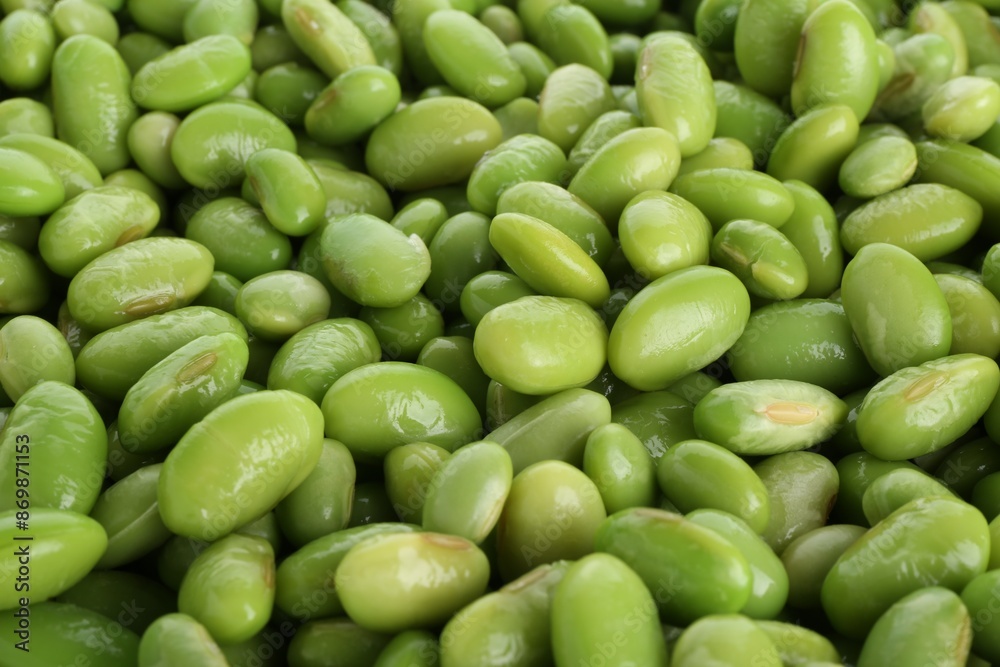Raw green edamame soybeans as background, closeup Raw green edamame soybeans as background, closeup