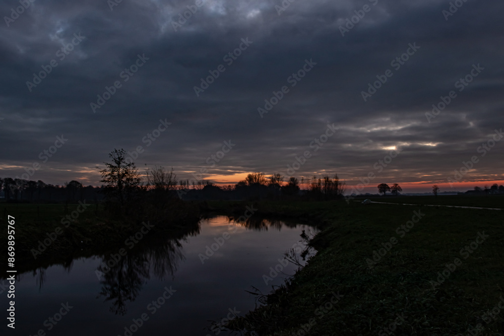 Fototapeta premium sunset over the river