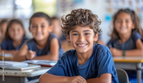 Group of happy students in the classroom smiling and learning together