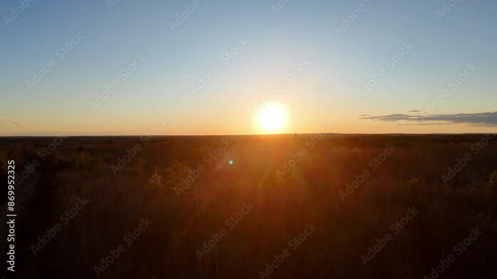 Beautiful sunset over a forest aerial view - travel photography by drone Beautiful sunset over a forest aerial view - travel photography by drone