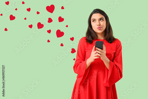 Thoughtful young woman with...