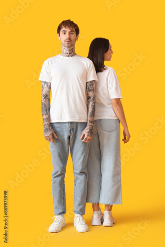 Young couple in stylish jea...