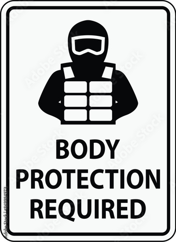 A clear safety sign indicating the mandatory use of body protection gear in a designated area.