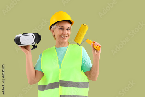 Mature female worker with V...
