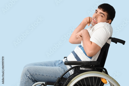 Young man in wheelchair on ...