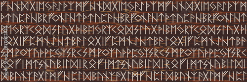 Seamless pattern with viking runic alphabet, the elder futhark. Norse and Germanic ancient magical symbols on the dark background.